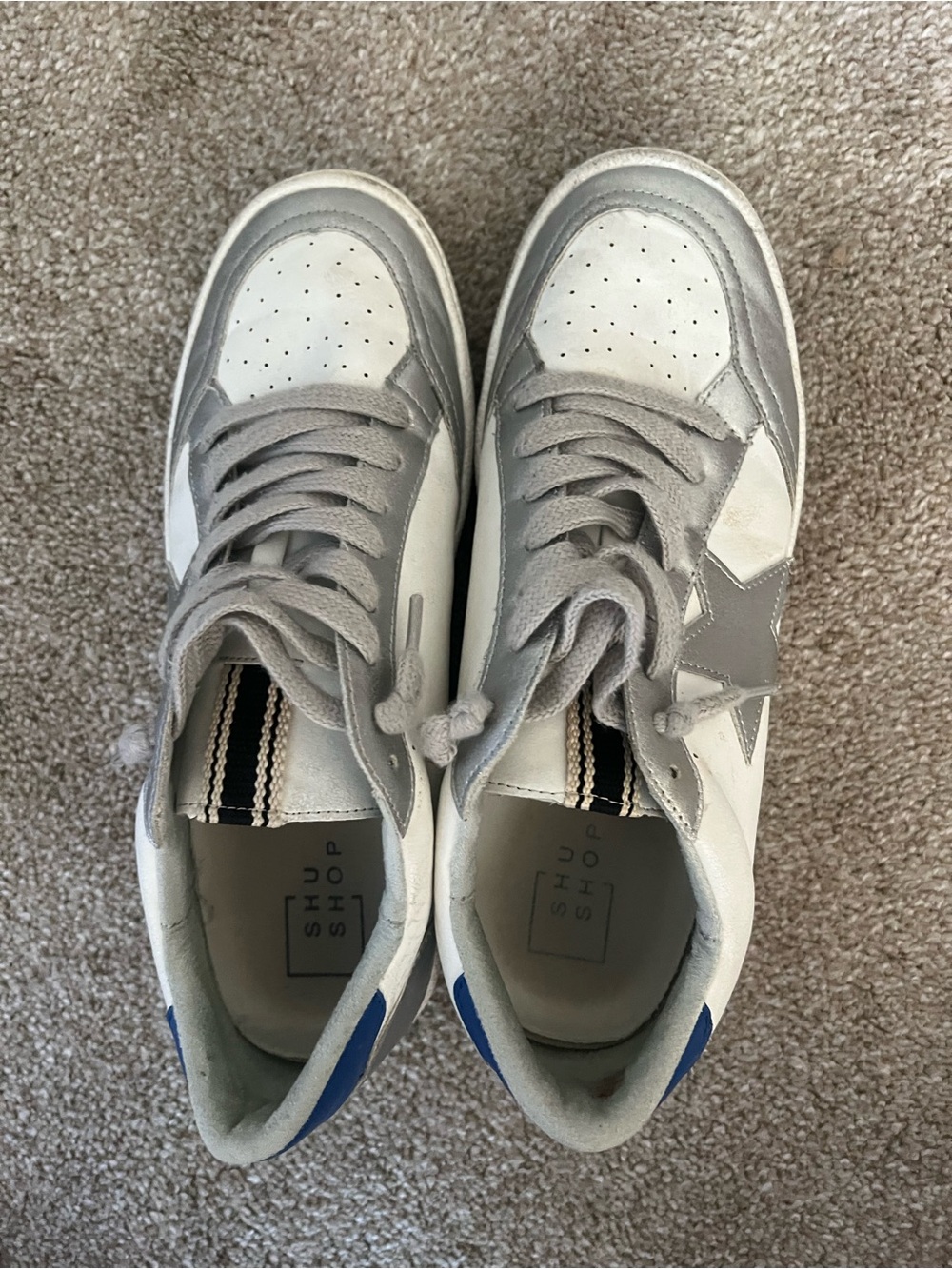 White and Gray Low-Top Sneakers with Blue Accent
